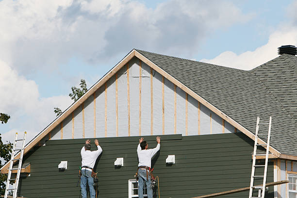Professional Storm Damage Siding Repair technician working in Tarentum, PA